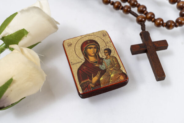 Theotokos Portaitissa Miniature Handmade Wooden Icon so small that you always have it with you .